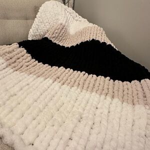 Handmade chunky knit Adult throw.  Black, white and pale pink.